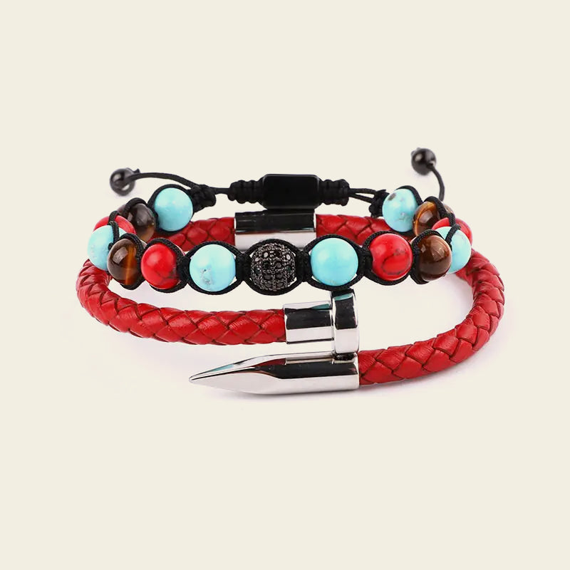 Bracelet with colorful beads and a metal clasp on a wrist against a neutral background