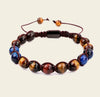 Bracelet with multicolored beads on a beige background
