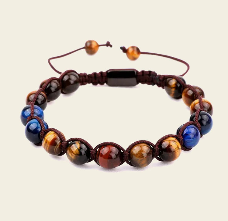 Bracelet with multicolored beads on a beige background