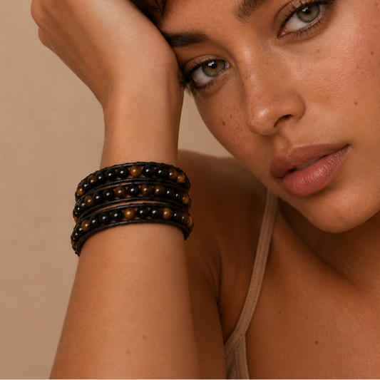 Woman with short hair and bracelets on a beige background