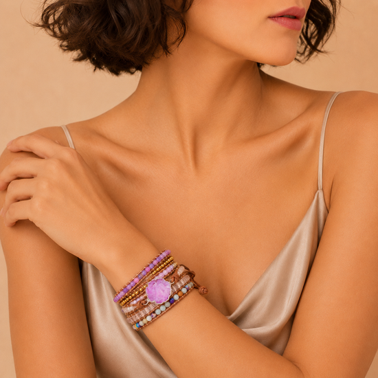 Woman wearing a bracelet with a neutral background
