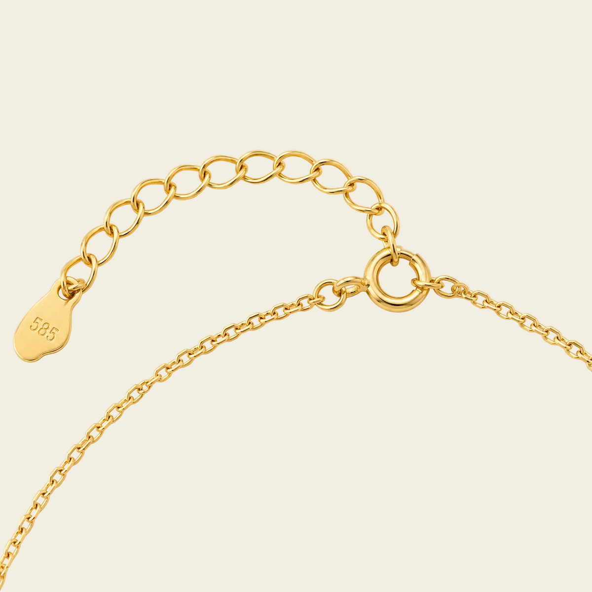 Gold Clasp on a beige background