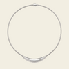 A silver snake chain necklace with a curved, polished silver bar pendant, displayed on a solid light beige background.