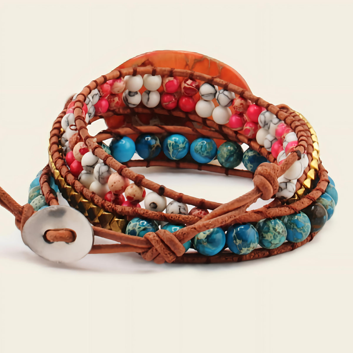 Multicolored beaded bracelet with leather strap on a beige background