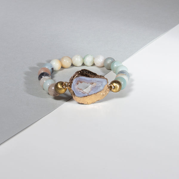 Handmade bracelet with blue geode centrepiece, natural stone beads and gold accents, elegant jewellery gift for her