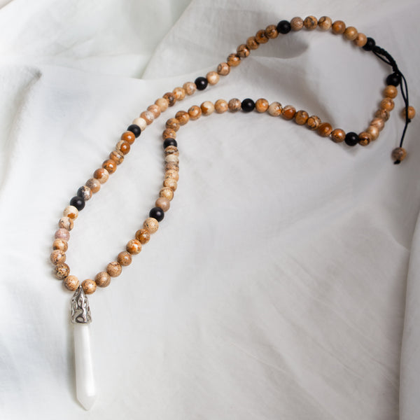 Handmade necklace with natural picture jasper beads and a pyramid pendant, adjustable for a personalized fit and a boho-chic style.