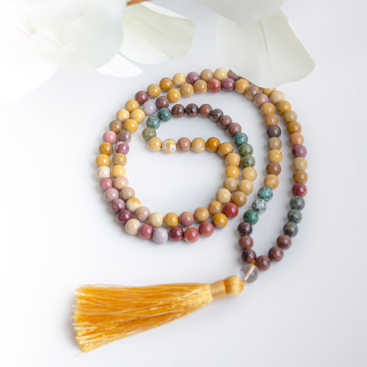 Handmade necklace with multicoloured Jasper beads in earthy tones and a silky yellow tassel