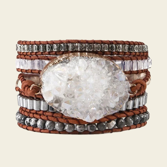 Five-layer handmade bracelet with a stunning clear quartz druzy centerpiece, silver and brown leather details for a unique, stylish look.