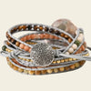 Adjustable 5-layer handmade bracelet featuring natural stones and an ammonite fossil pendant with silver-toned accents – boho jewellery for men and women.