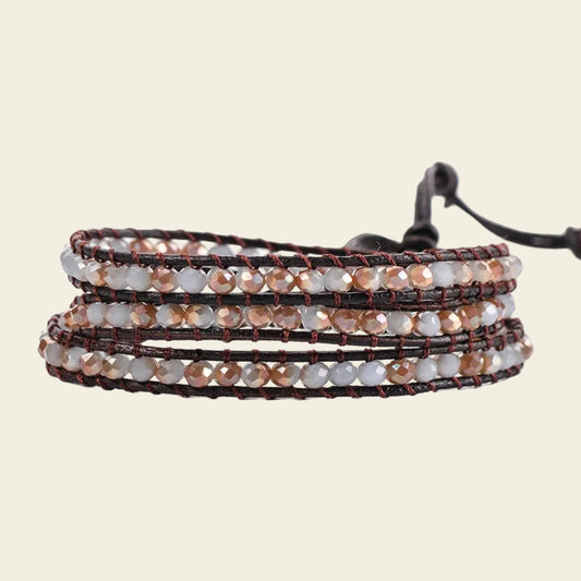 Handmade 3-layer wrap bracelet with crystal beads and leather cord, adjustable closure, bohemian style.