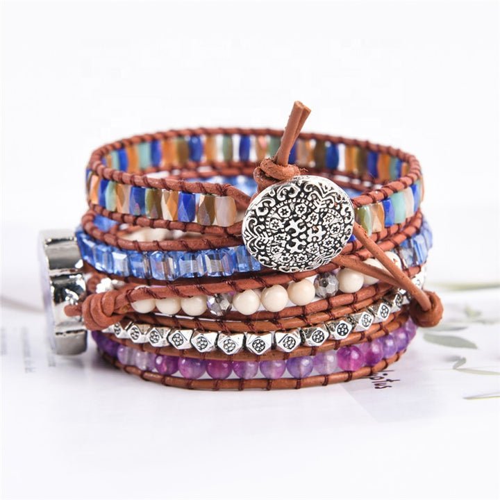 Handmade 5-layer adjustable bracelet featuring a beautiful grape agate slice centerpiece, complemented by colourful beads and silver accents, designed in a stylish boho style.
