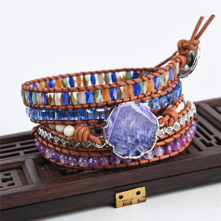 Handmade 5-layer adjustable bracelet featuring a stunning grape agate slice centerpiece, surrounded by multi-colored beads and silver accents, perfect for boho style lovers.