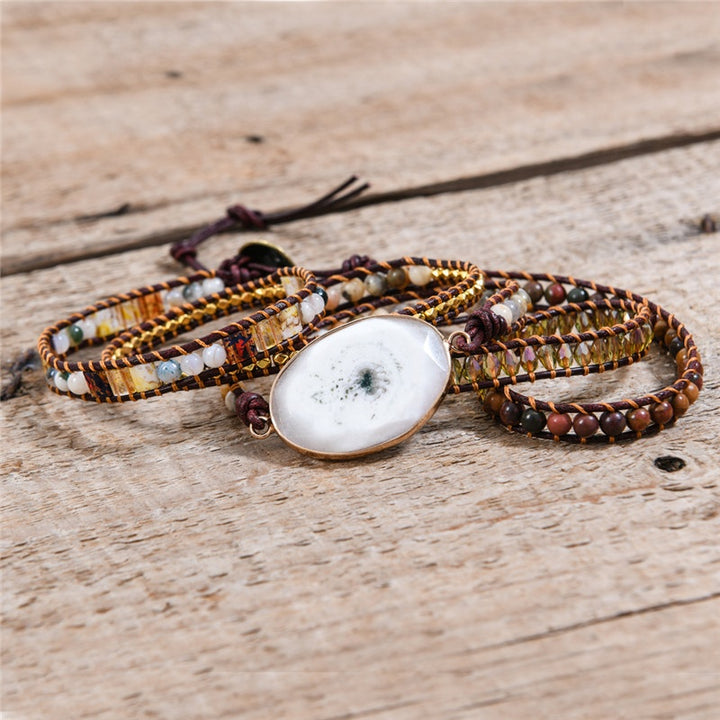 5-layer wrap bracelet featuring natural Botswana agate beads, golden accents, and a striking white agate focal stone, adjustable fit, perfect for boho enthusiasts.