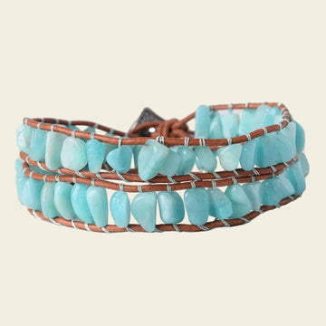 Handmade boho bracelet featuring natural Amazonite beads in soothing blue hues, designed with a two-layer adjustable leather band, perfect for casual and beachwear.
