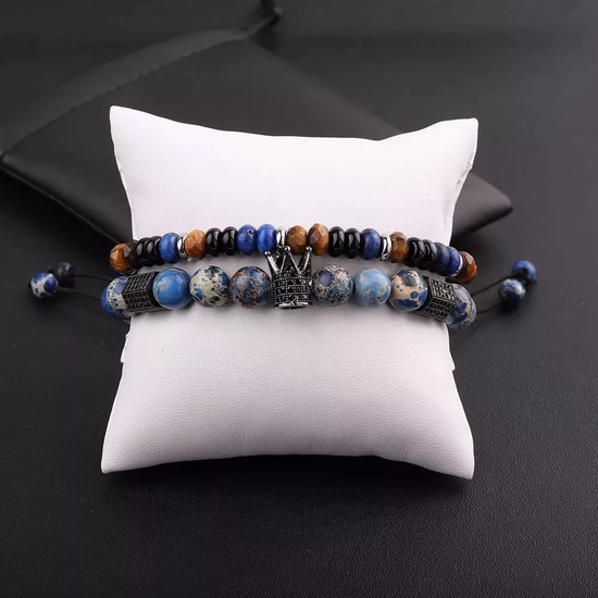 Boho-style bracelet set featuring blue stone and tiger’s eye beads, accented with a crown charm and adjustable design, perfect for casual or gift occasions.