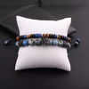 Boho-style bracelet set featuring blue stone and tiger’s eye beads, accented with a crown charm and adjustable design, perfect for casual or gift occasions.