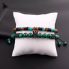 Boho-style bracelet set featuring green malachite and tiger’s eye beads, accented with a crown charm and adjustable design, perfect for casual or gift occasions.