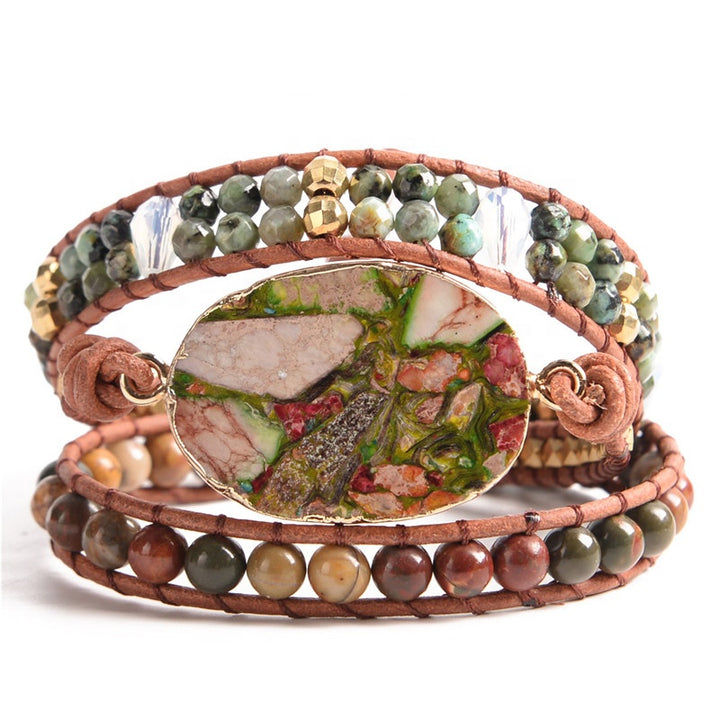 Handmade 3-layer adjustable bracelet featuring Rainforest Jasper stones, earthy hues, and gold accents on leather cord, perfect for boho jewellery lovers.