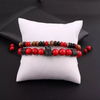Boho-style bracelet set with red stone and tiger’s eye beads, featuring a crown charm and adjustable design, perfect for casual or gift occasions.