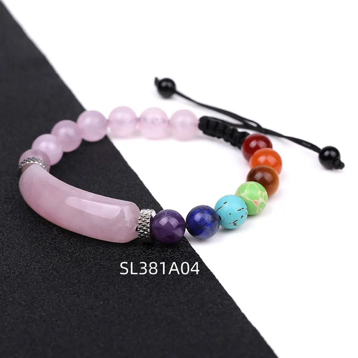 Handmade adjustable beaded bracelet featuring a curved Rose Quartz stone, multicolor gemstone beads, and stainless steel accents, designed with a black woven cord.