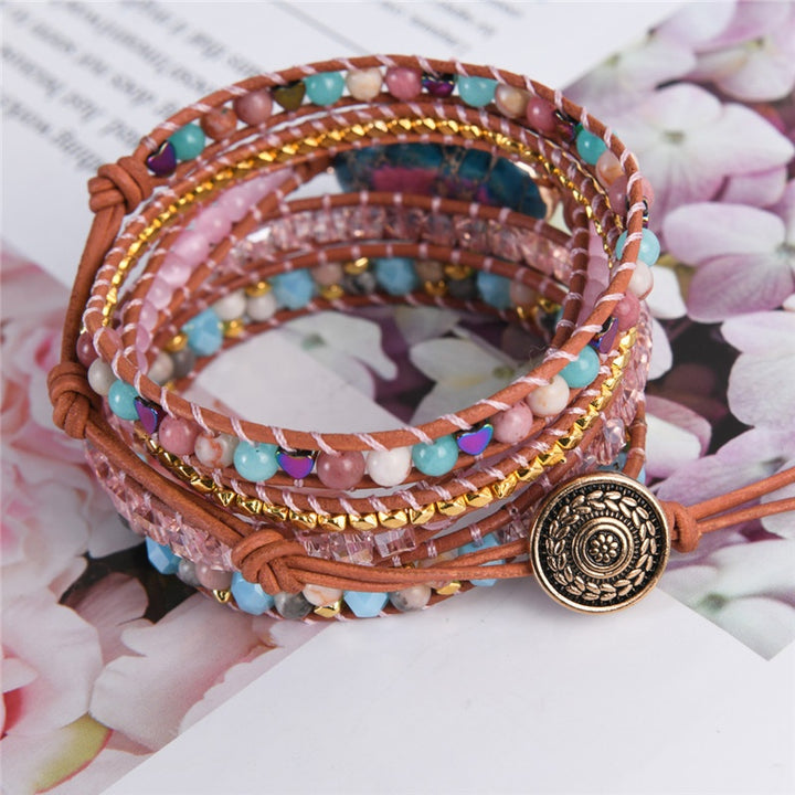 Handmade adjustable bracelet featuring Ruby In Kyanite stone with soft pink and turquoise beads, finished with a vintage-style button closure, ideal for gifting.
