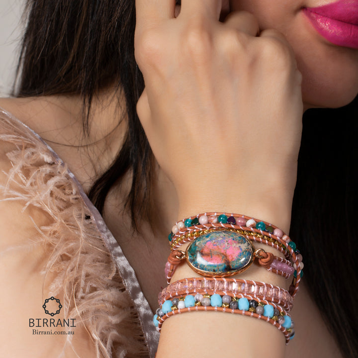 Handmade adjustable bracelet with Ruby In Kyanite stone, featuring natural stone beads in pink, turquoise, and gold accents, perfect for boho style lovers and gifts.