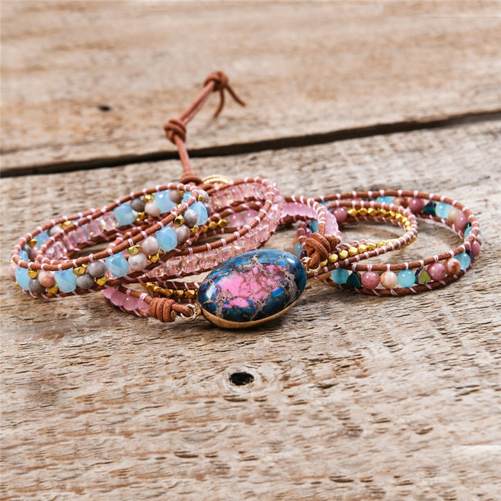 Handmade adjustable bracelet featuring a stunning Ruby In Kyanite stone, complemented by pink and turquoise beads, with a boho-inspired design, perfect as a thoughtful gift.