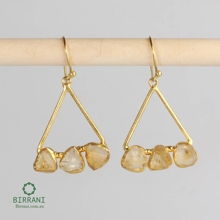 Handmade gold-plated earrings featuring Citrine natural stones in a triangle setting, offering an elegant and radiant touch to your jewellery collection.