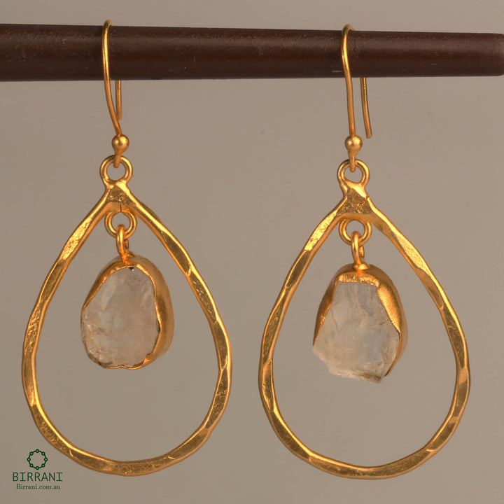 Handmade drop earrings with natural Rose Quartz stones, set in a gold-plated teardrop frame. Elegant and timeless, perfect for both casual and formal occasions.