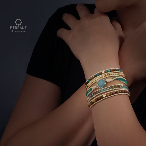 Five-layer handmade bracelet featuring Amazonite stones, turquoise accents, and gold metallic elements for a chic and unique accessory.