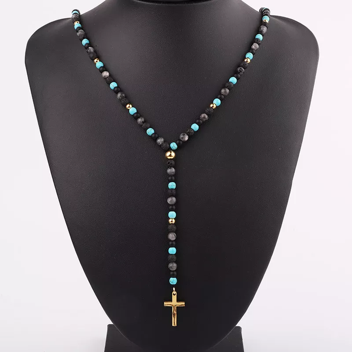 Handmade lava stone and turquoise bead necklace with gold accents and a gold cross pendant, perfect for spiritual and casual wear.