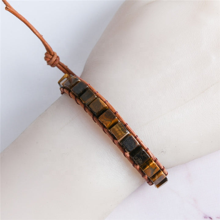 Handmade tiger’s eye square bead bracelet with adjustable leather band, featuring a rustic and earthy boho design.