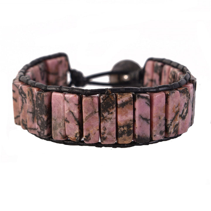 Handmade adjustable bracelet with Rhodonite natural stone tubes, featuring earthy pink and black tones, perfect for boho jewellery lovers.