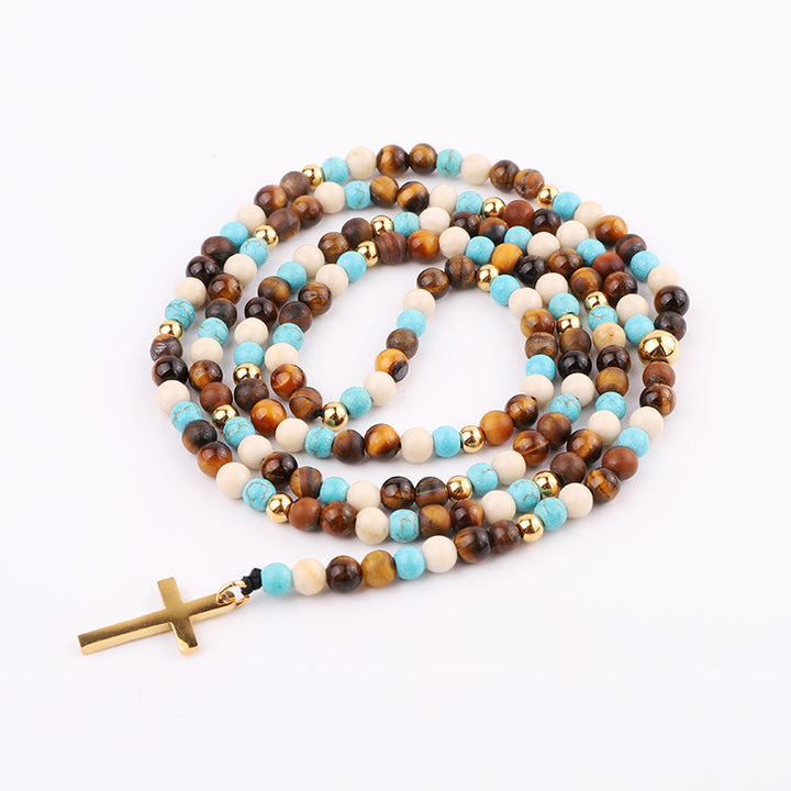 Handmade necklace with a mix of Tiger's Eye, turquoise, and gold accent beads, featuring a gold cross pendant.