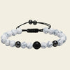 Handmade adjustable bracelet featuring white howlite beads with black accents, stylish boho jewellery for everyday wear or as a thoughtful gift.